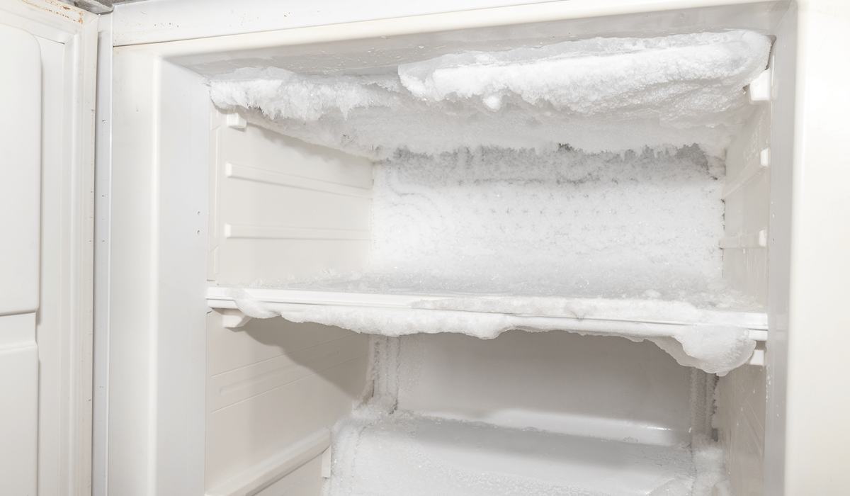 Heavy frost build-up on a refrigerator evaporator coil